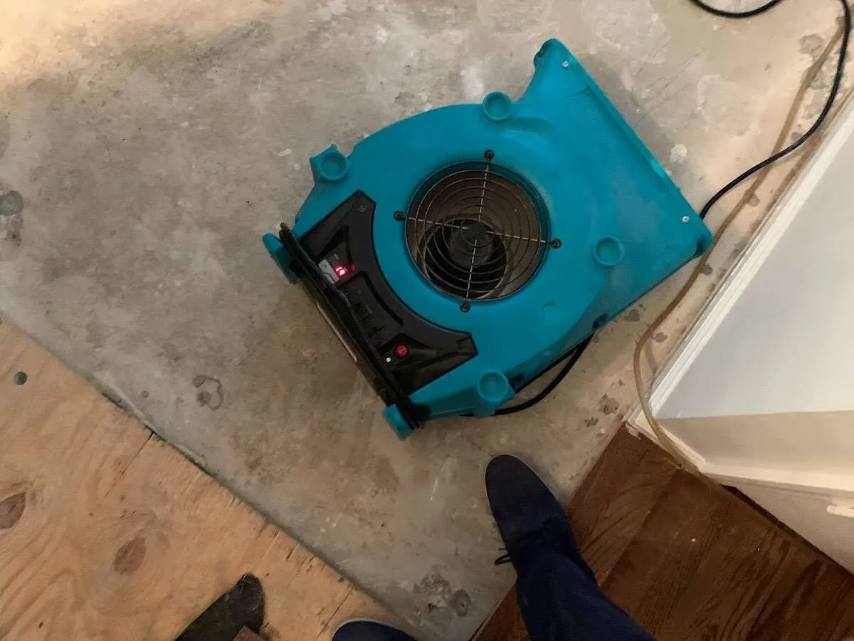 Air mover drying subfloor during Leak Detection & Repair in Snowflake